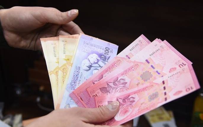 مناقشة مقترح ربط الليرة السورية بالريال السعودي لجورج خزام، وموقف مصرف سوريا المركزي وحقيقة استبدال العملة بعد حذف الأصفار.